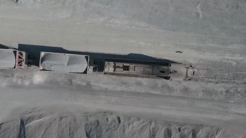 A freight train loaded with sand Stock Footage 202068215