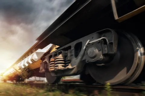Freight train in motion. Freight transportation. Cargo delivery. Blur effect. Stock Photos