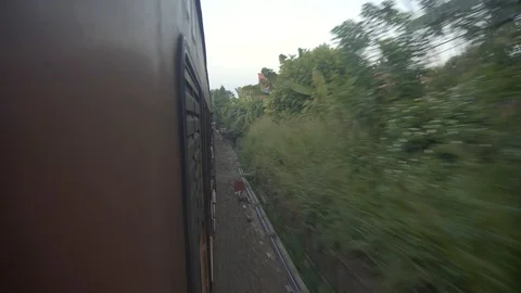 Freight Train Moves Fast in Suburbs near Buildings of City. Stock Footage 118259789