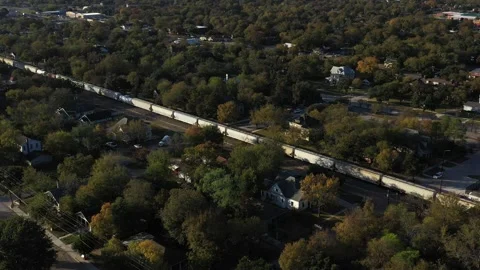 Freight Train Moving Through a Residential Neighborhood, Bryan, Texas, USA Stock Footage 144035055