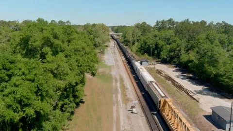 Freight train moving through the town of Folkston, Georgia Stock Footage 275383645