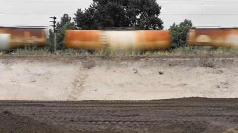 The freight train passes a construction site Stock Photos