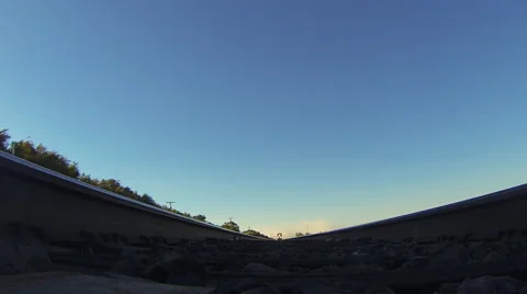 A freight train passes directly over the camera. Stock Footage 55412478