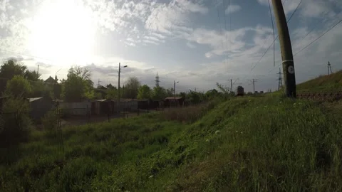 Freight train passes fast by rail Stock Footage 130562024