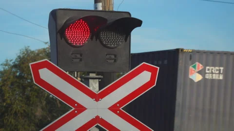 A Freight Train Passes A Railway Crossin Stock Video Pond5