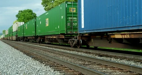 Freight Train Passes Through Frame Perspective Shot Stockbeeldmateriaal 92491721