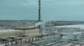 Freight train passing far a distance of water treatment plant HD Footage