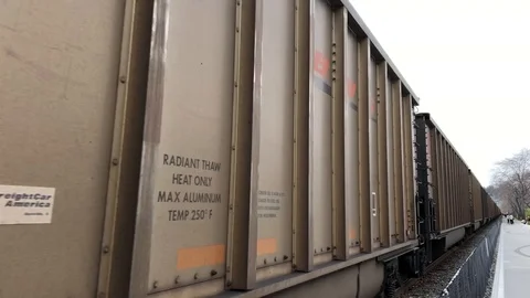 Freight Train passing Stock Footage 107023494