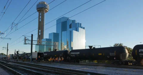 Freight train passing in front of Reunion tower Stock Footage 57464816