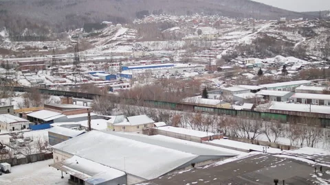 Freight Train Passing On The Industrial Area In Winter Day Stock Footage 229963247