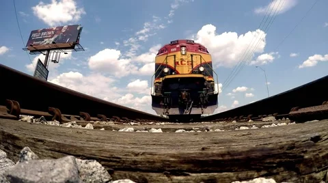 Freight Train passing over camera Stock Footage