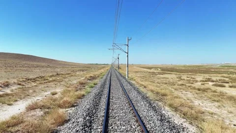 Freight train passing over the rails whatman view first person Stock Footage 284770729