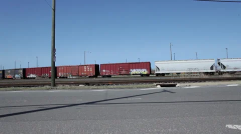 Freight train passing by in Philadelphia harbor area Stock Footage 36971544