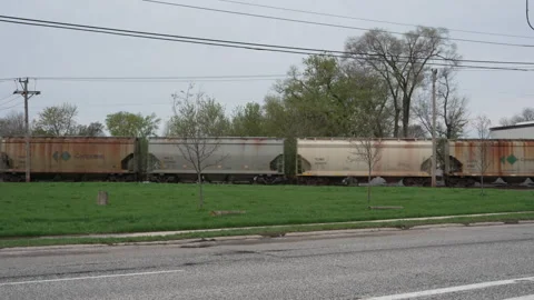 Freight train passing by roadside with realistic train sound Stock Footage 334443714