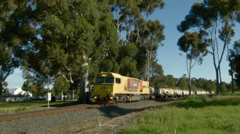 Freight Train Passing Through A Country Town Stock Footage 45599108