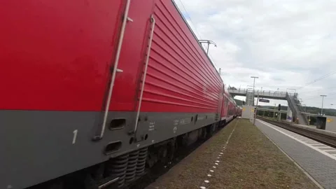 Freight Train Passing Through Mid-West Town Stock Footage 135262699