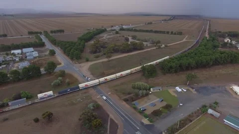 Freight train passing through Snowtown South Australia aerial 4k Stock Footage 282069551