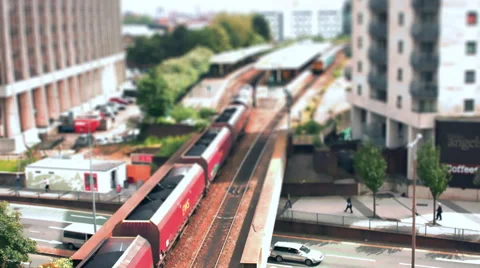 Freight Train passing through Station. Tilt Shift Timelapse. 스톡 동영상 56029369