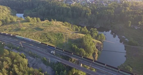 The freight train is on the railway bridge Stock Footage 83425457