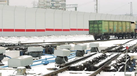 Freight train at the railway station in the winter Video stock 59963048