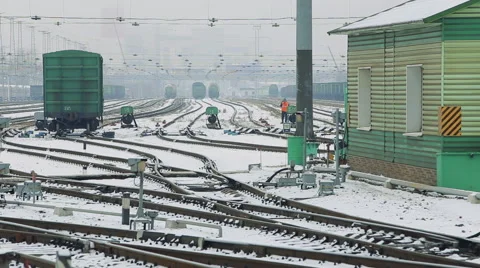 Freight train at the railway station in the winter Stock Footage 59963209