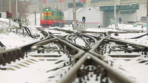 Freight train at the railway station in the winter Stock Footage 59963243