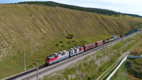 Freight train rides fast Stock Footage 87789911