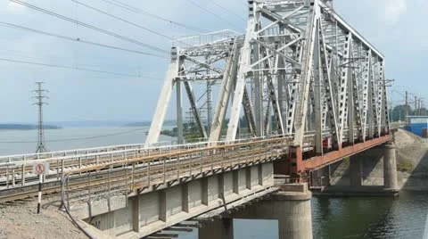 Freight train rides on the railway bridge Stock Footage 20431348