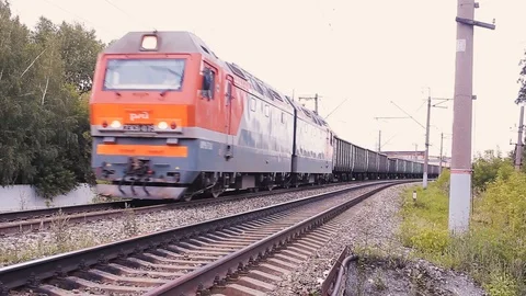 Freight Train rides in the summer Stock Footage 113859505