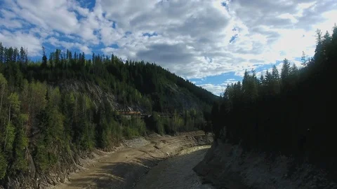 Freight Train Rogers Pass by Beaver River and Kinbasket Lake BC Canada Stock Footage 92323912