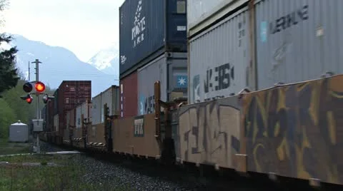 Freight Train Rushing Past in British Columbia Stock Footage 10997775