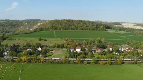 Freight train, Saale valley in autumn , Bad Kösen, Burgenlandkreis, Saxony-Anh Video stock 219324734