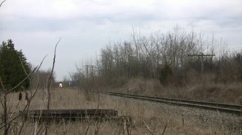 Freight train slowly moves down tracks (High Definition) Stock-Footage 69255