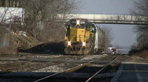 Freight train slowly moves forward, pulling small load (High Definition) Stock Footage 69836