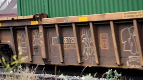 Freight train speeding down the tracks, shot 1. Stock-Footage 79597014