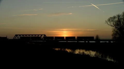 Freight Train at Sunset Video stock 122735370