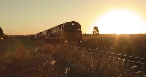 Freight train at sunset Stock Footage 171141230