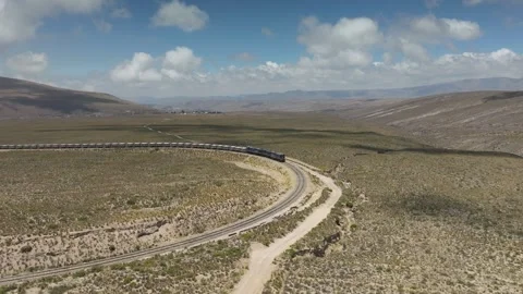 Freight train transporting minerals on railway route in Arequipa, Peru Stock Footage 308214207