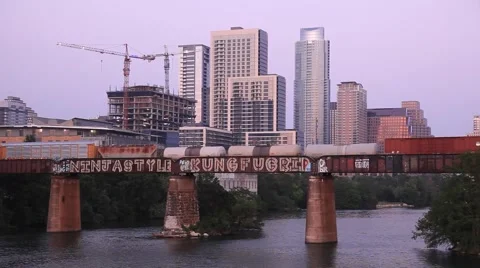 Freight train wagons on a bridge in Austin, Tx, USA Stock Footage 62559766