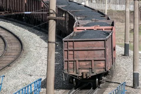 Freight train with wagons full of coal 스톡 사진
