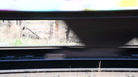 Freight train wheels passing by at high speed, blurred, 4k Stock Footage 152582070