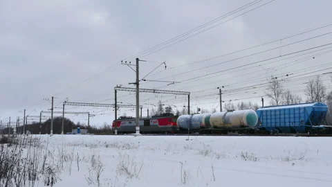 Freight train in winter time lapse Stock Footage 148864239