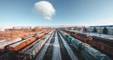 Freight trains from a height at the marshalling yard. Delivery of goods by fr Stock Photos