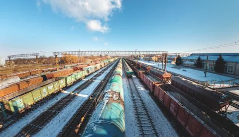 Freight trains from a height at the marshalling yard. Delivery of goods by fr Stock Photos