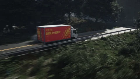 Freight van of the free delivery logistics company driving on the highway Stock Footage 303569311