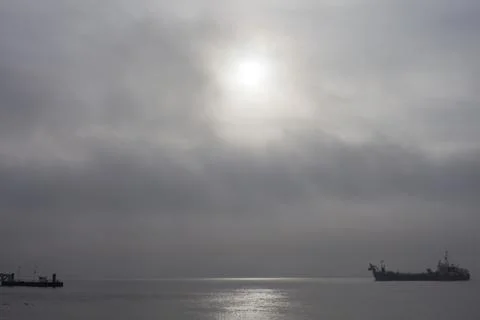 Freighter Approaching Harbor Foto stock