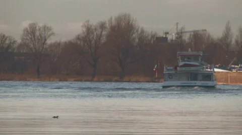 Freighter crossing ferry on river 'de Waal' Stock Footage 325166