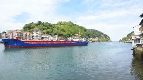 Freighter getting in harbour of Pasaia Stock Footage 63991052