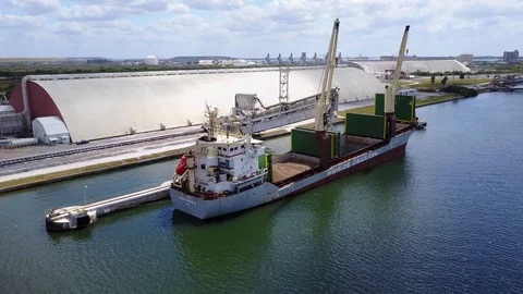 FREIGHTER AT LOADING FACILITY AERIAL PORT TAMPA BAY Stock Footage 126886767