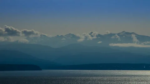 Freighter moving across the Olympics Stock Footage 36642794